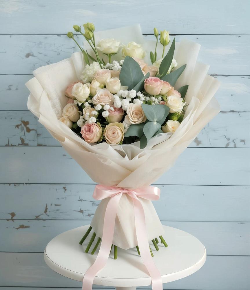 Букет цветов из: Розы и Лизиантусы в Юже